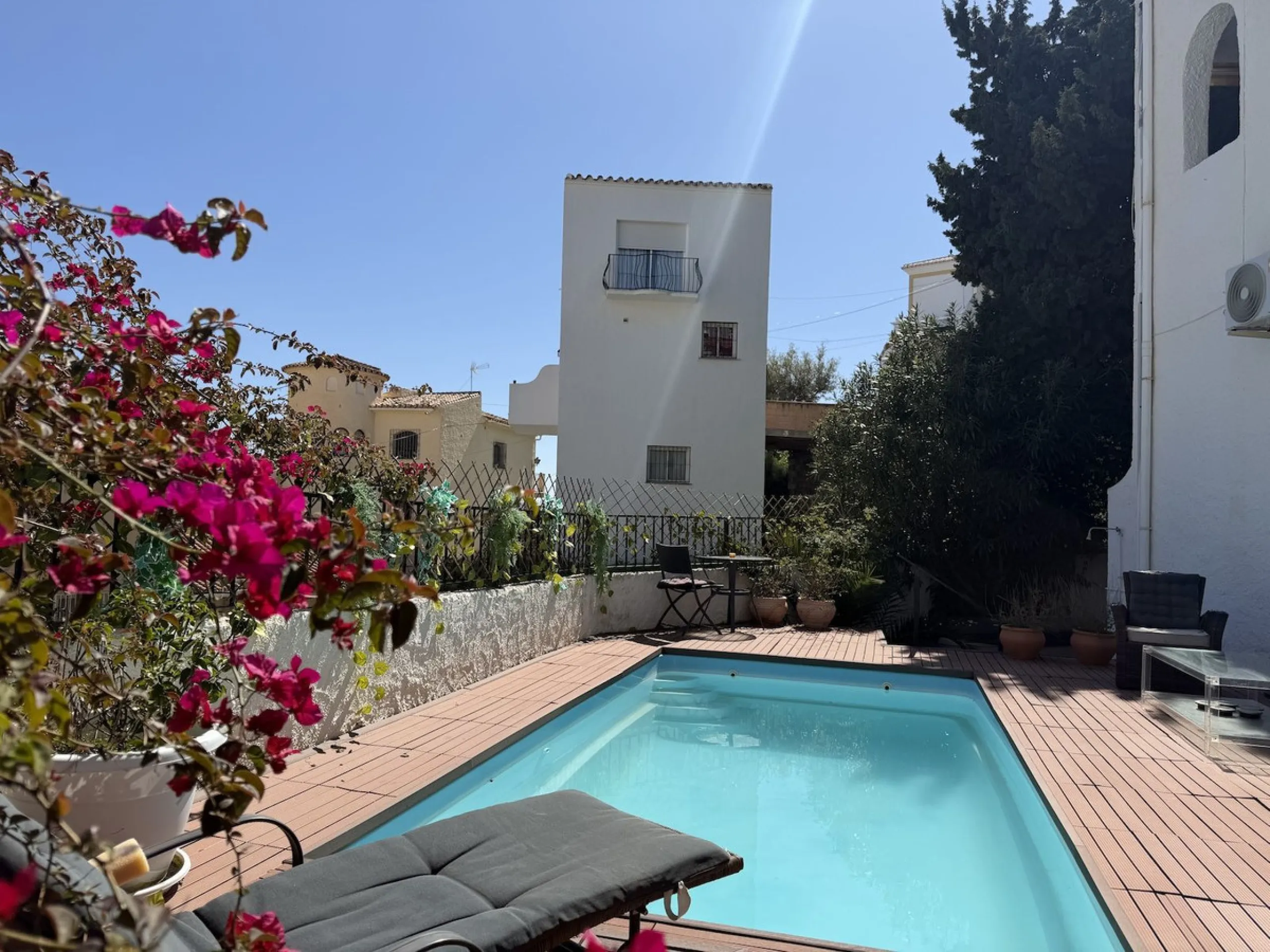 Lovely four bedroom, three bathroom villa built over three floors. Upon entering the main house, there is a spacious open plan kitchen and living room with fireplace, with a separate WC, an East facing balcony and a South facing terrace. The stairs lead t