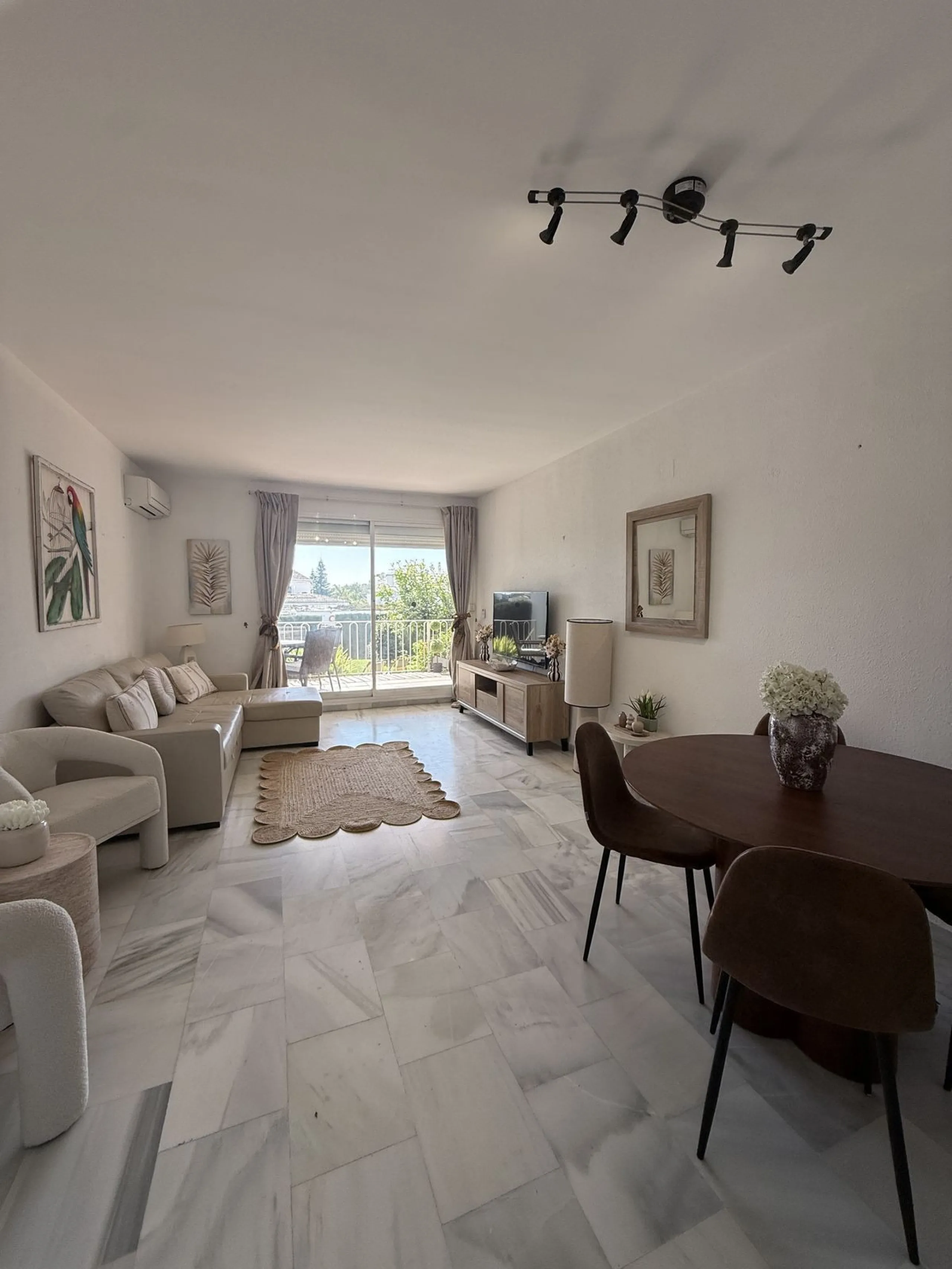 South-Facing Garden Apartment in Prime El Paraíso – Walk to School, Shops, Golf & Beach
