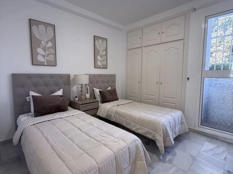 South-Facing Garden Apartment in Prime El Paraíso – Walk to School, Shops, Golf & Beach