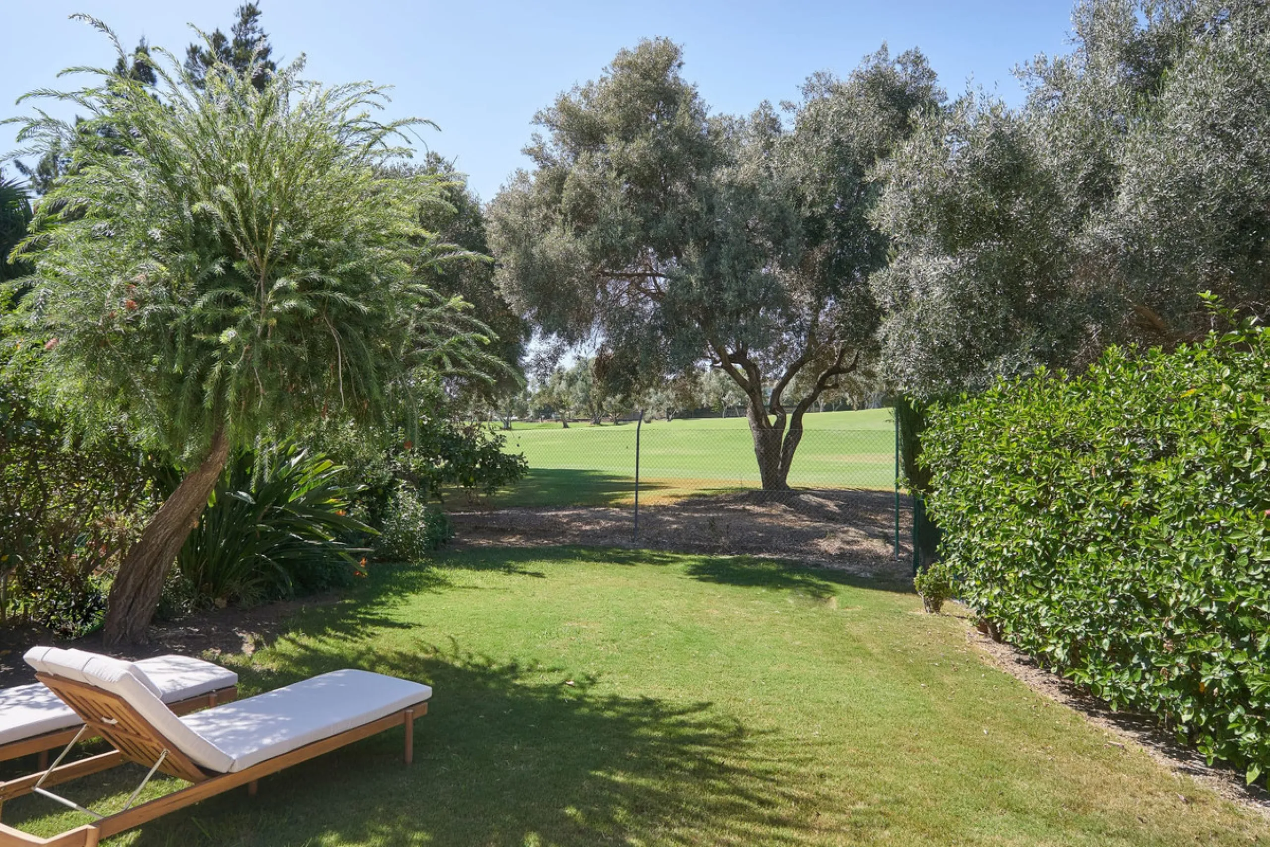 Frontline Aloha Golf townhouse nestled in the prestigious Golf Valley of Nueva Andalucía, this beautifully designed three-story townhouse offers a seamless blend of Mediterranean charm and modern living. Recently renovated, the property captures the lifes