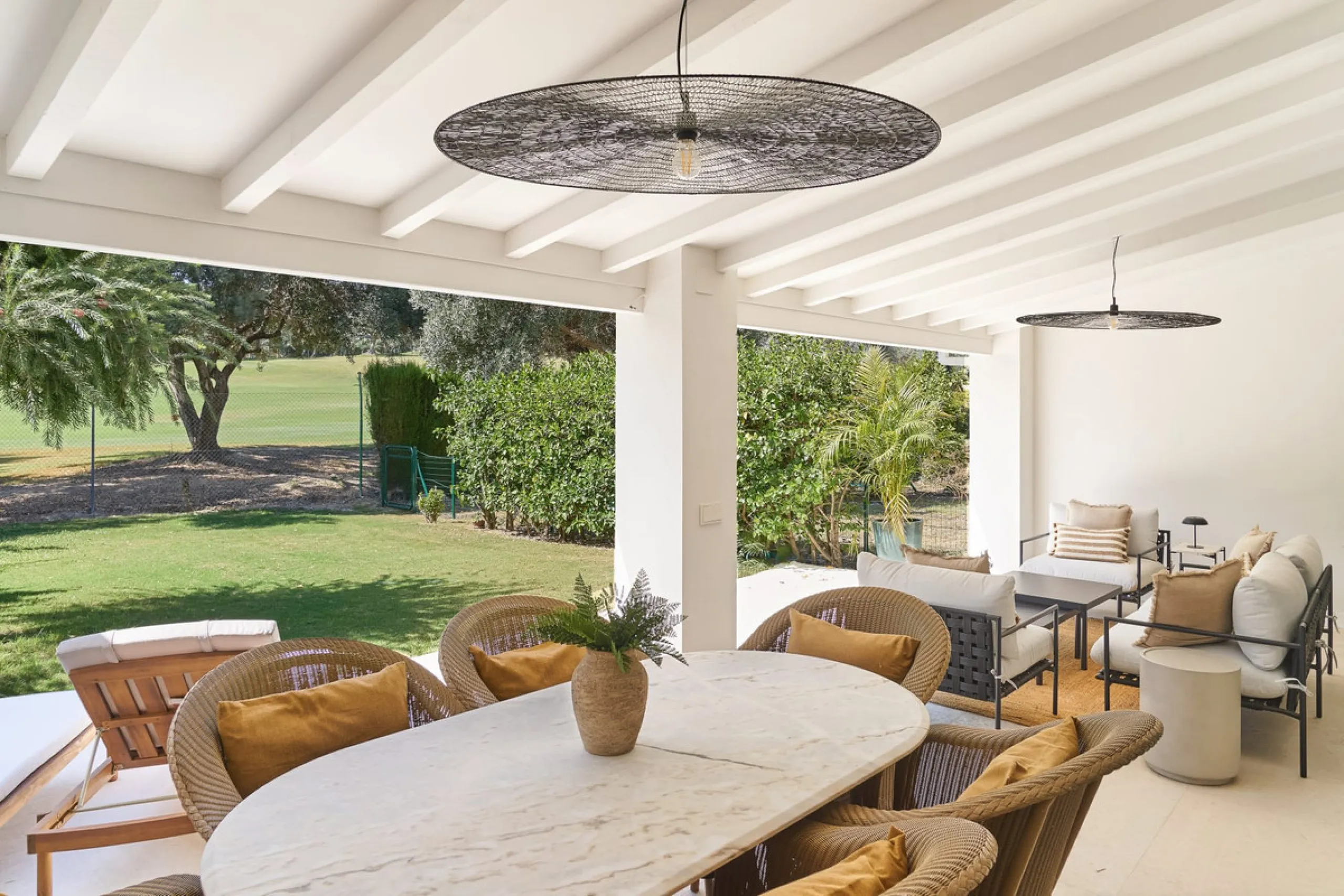 Frontline Aloha Golf townhouse nestled in the prestigious Golf Valley of Nueva Andalucía, this beautifully designed three-story townhouse offers a seamless blend of Mediterranean charm and modern living. Recently renovated, the property captures the lifes