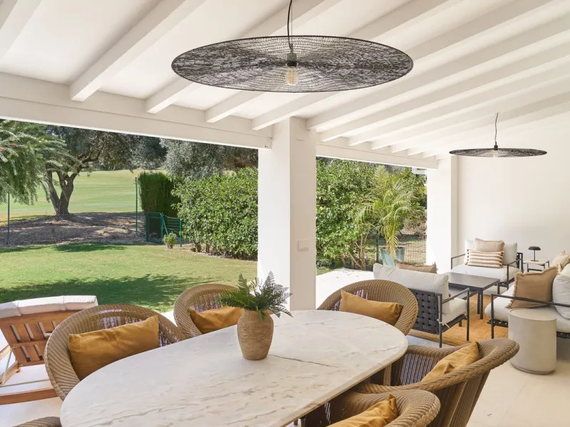 Frontline Aloha Golf townhouse nestled in the prestigious Golf Valley of Nueva Andalucía, this beautifully designed three-story townhouse offers a seamless blend of Mediterranean charm and modern living. Recently renovated, the property captures the lifes
