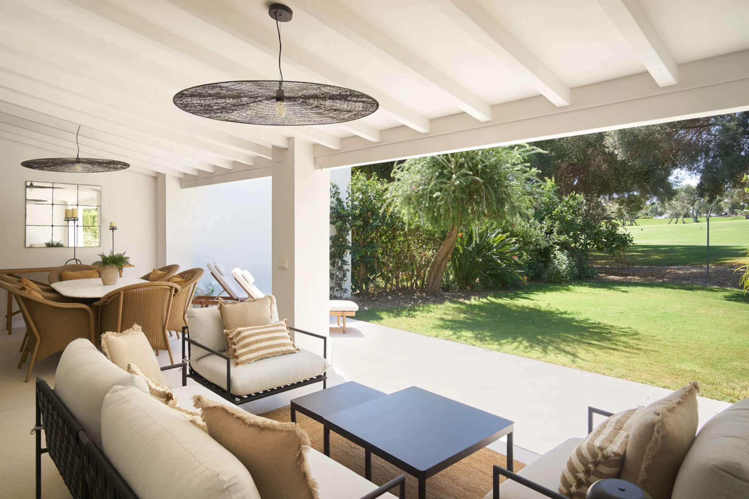 Frontline Aloha Golf townhouse nestled in the prestigious Golf Valley of Nueva Andalucía, this beautifully designed three-story townhouse offers a seamless blend of Mediterranean charm and modern living. Recently renovated, the property captures the lifes