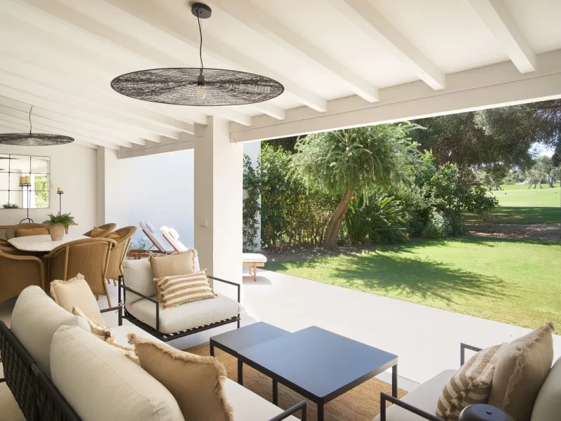 Frontline Aloha Golf townhouse nestled in the prestigious Golf Valley of Nueva Andalucía, this beautifully designed three-story townhouse offers a seamless blend of Mediterranean charm and modern living. Recently renovated, the property captures the lifes