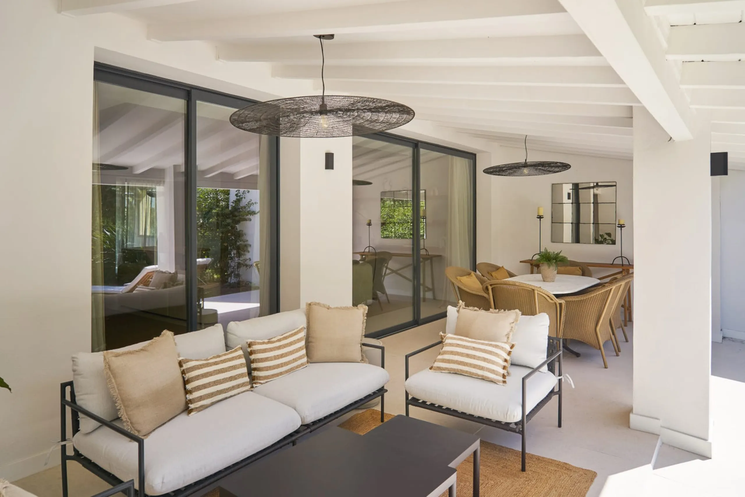 Frontline Aloha Golf townhouse nestled in the prestigious Golf Valley of Nueva Andalucía, this beautifully designed three-story townhouse offers a seamless blend of Mediterranean charm and modern living. Recently renovated, the property captures the lifes