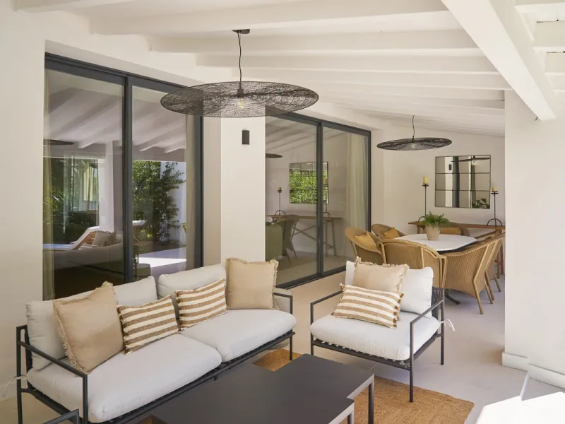 Frontline Aloha Golf townhouse nestled in the prestigious Golf Valley of Nueva Andalucía, this beautifully designed three-story townhouse offers a seamless blend of Mediterranean charm and modern living. Recently renovated, the property captures the lifes