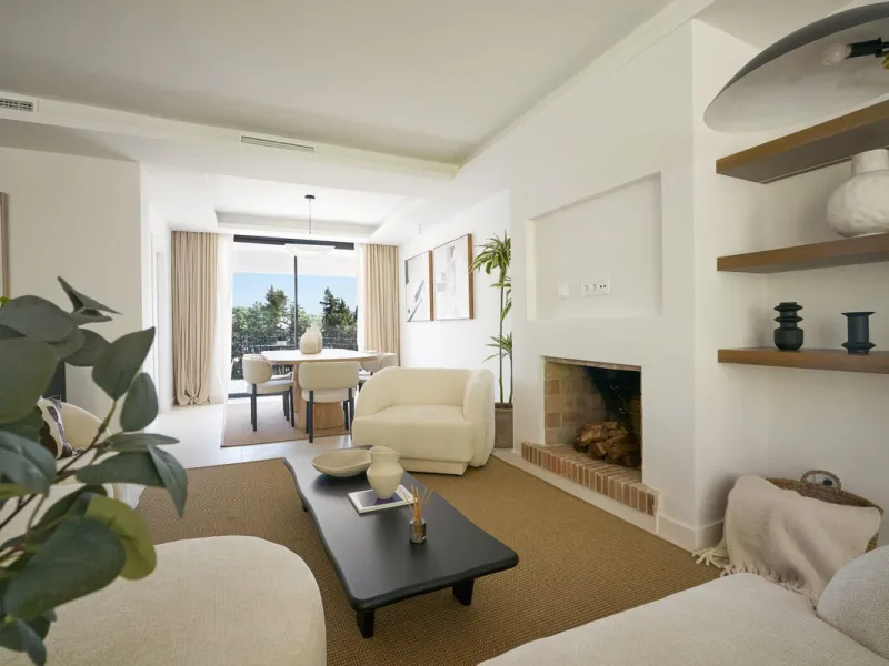 Frontline Aloha Golf townhouse nestled in the prestigious Golf Valley of Nueva Andalucía, this beautifully designed three-story townhouse offers a seamless blend of Mediterranean charm and modern living. Recently renovated, the property captures the lifes