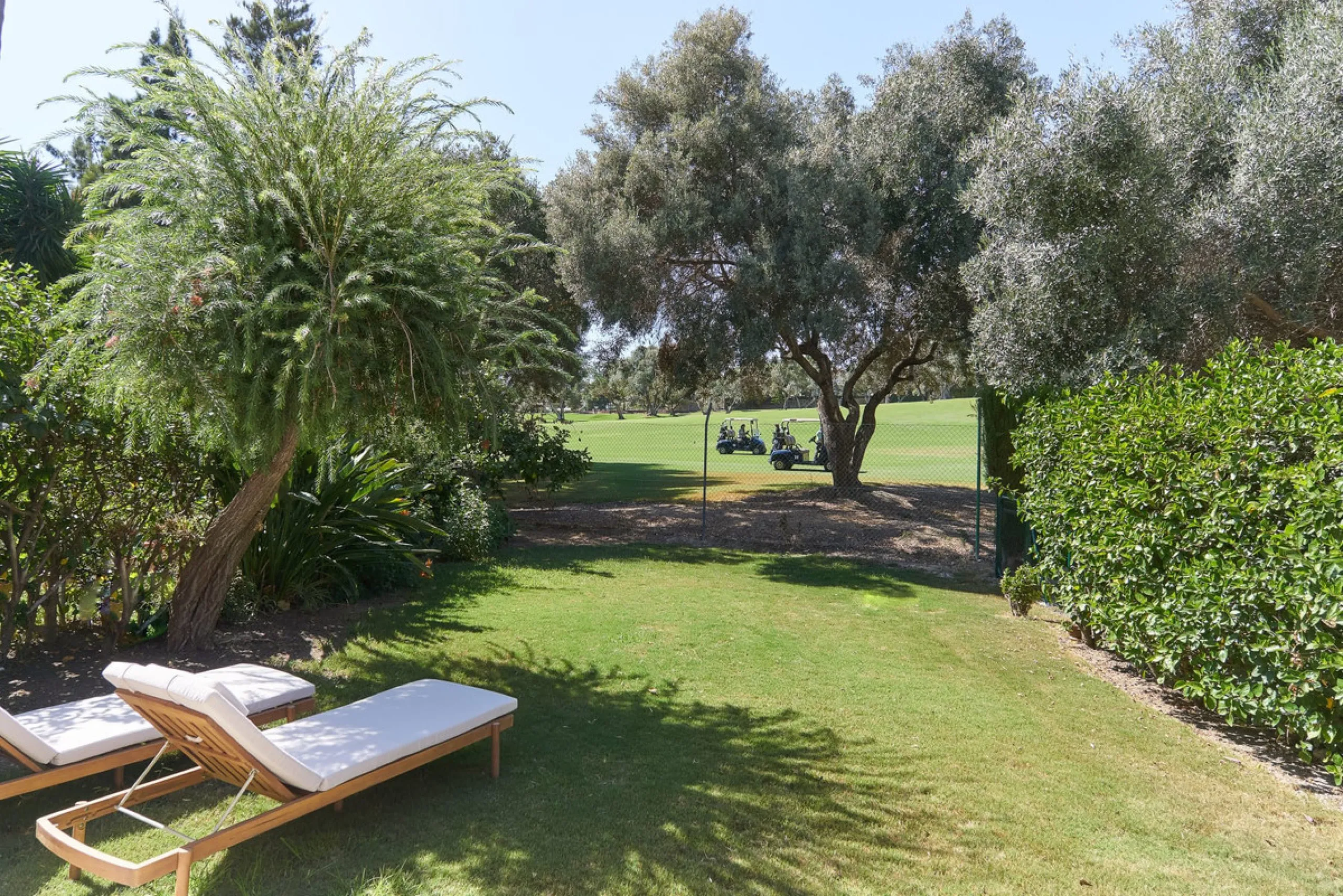 Frontline Aloha Golf townhouse nestled in the prestigious Golf Valley of Nueva Andalucía, this beautifully designed three-story townhouse offers a seamless blend of Mediterranean charm and modern living. Recently renovated, the property captures the lifes
