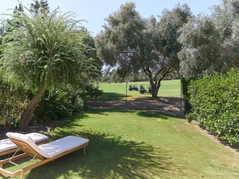 Frontline Aloha Golf townhouse nestled in the prestigious Golf Valley of Nueva Andalucía, this beautifully designed three-story townhouse offers a seamless blend of Mediterranean charm and modern living. Recently renovated, the property captures the lifes