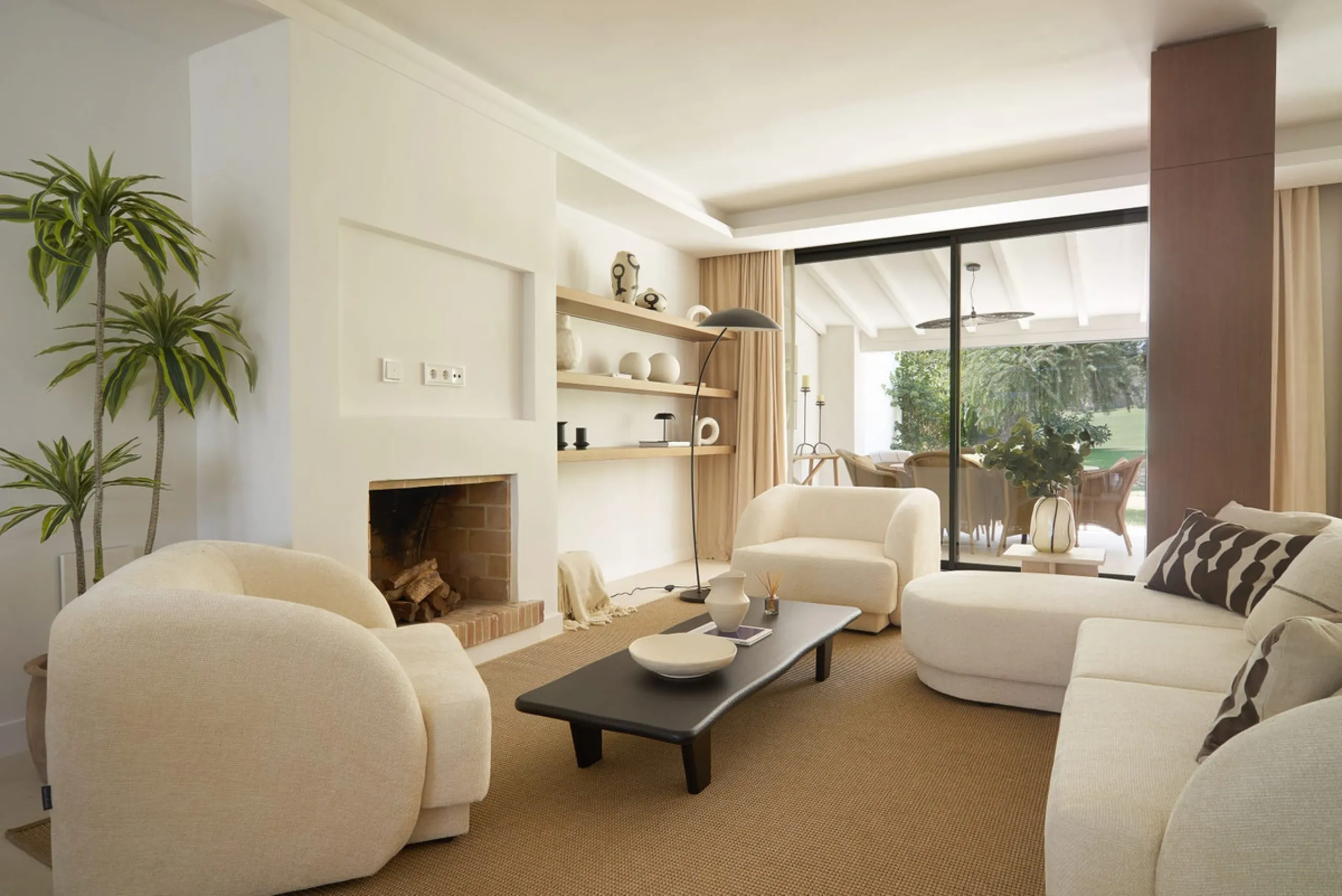 Frontline Aloha Golf townhouse nestled in the prestigious Golf Valley of Nueva Andalucía, this beautifully designed three-story townhouse offers a seamless blend of Mediterranean charm and modern living. Recently renovated, the property captures the lifes