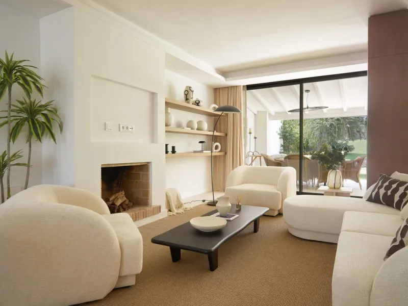 Frontline Aloha Golf townhouse nestled in the prestigious Golf Valley of Nueva Andalucía, this beautifully designed three-story townhouse offers a seamless blend of Mediterranean charm and modern living. Recently renovated, the property captures the lifes