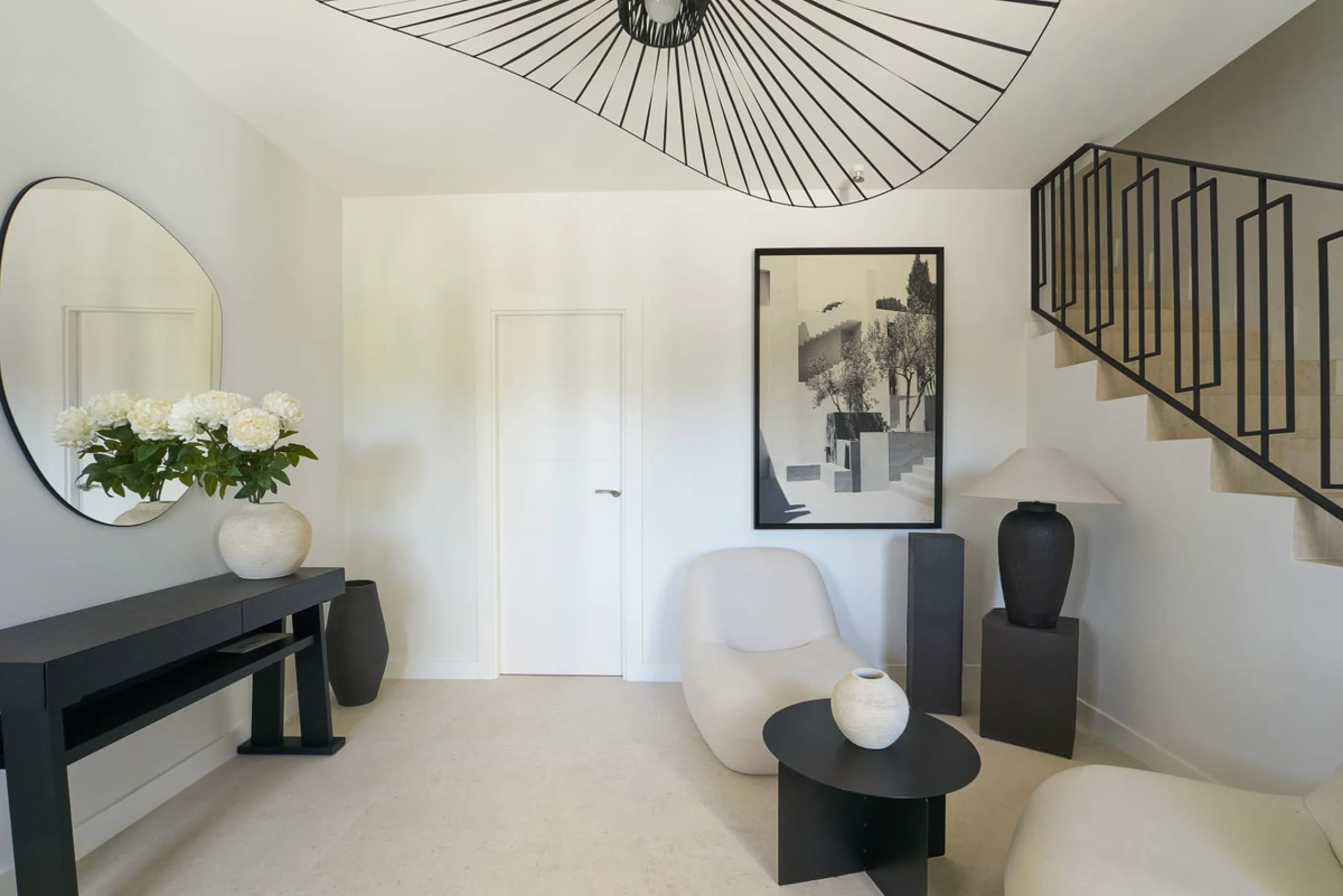 Frontline Aloha Golf townhouse nestled in the prestigious Golf Valley of Nueva Andalucía, this beautifully designed three-story townhouse offers a seamless blend of Mediterranean charm and modern living. Recently renovated, the property captures the lifes
