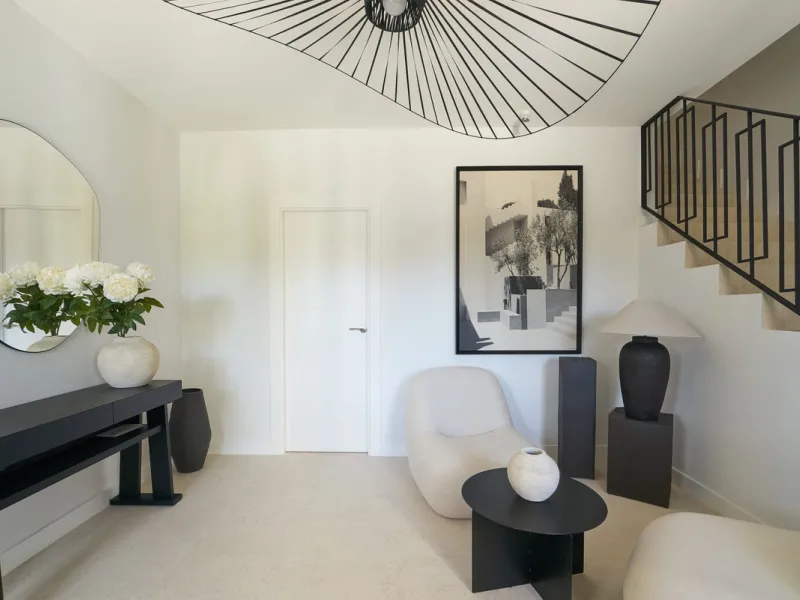 Frontline Aloha Golf townhouse nestled in the prestigious Golf Valley of Nueva Andalucía, this beautifully designed three-story townhouse offers a seamless blend of Mediterranean charm and modern living. Recently renovated, the property captures the lifes