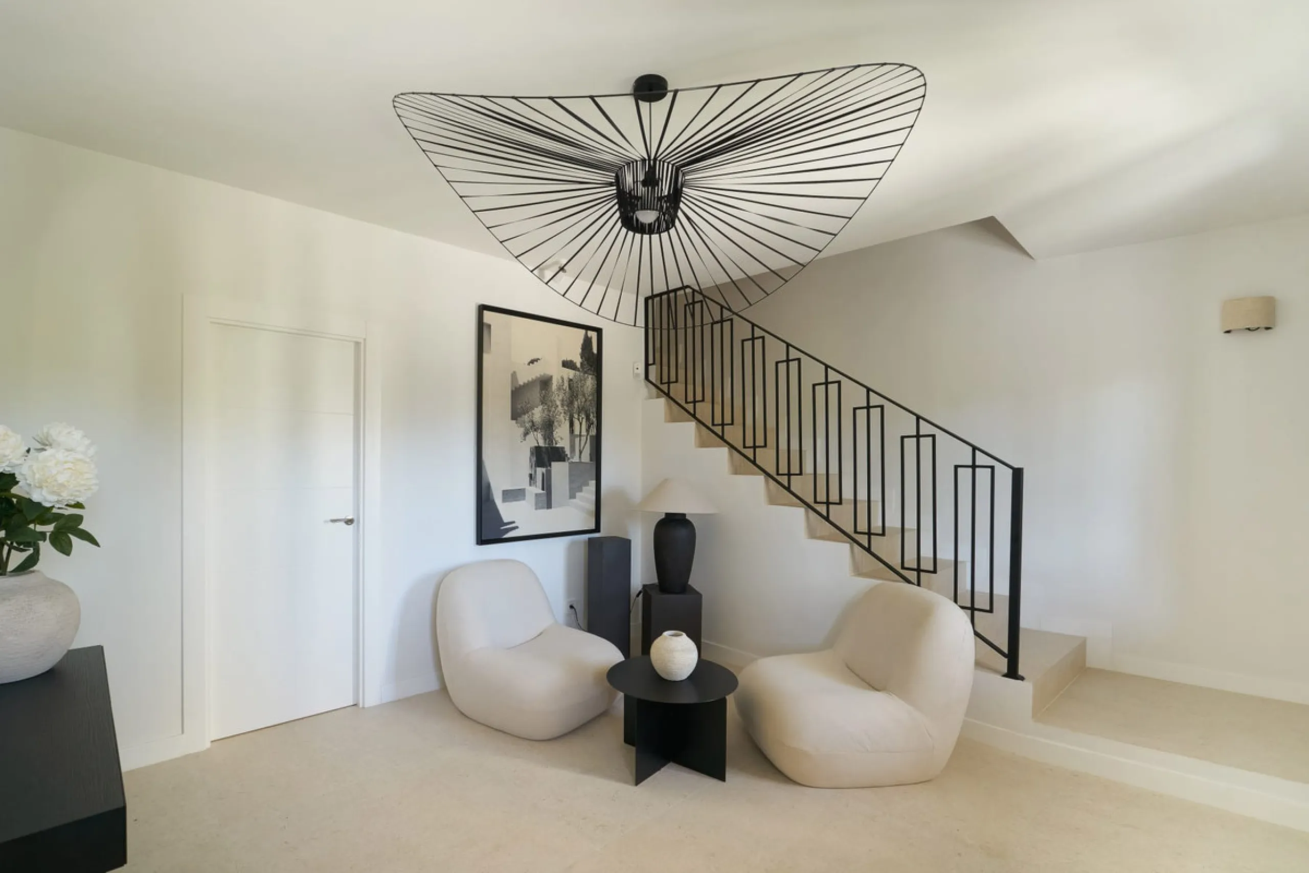 Frontline Aloha Golf townhouse nestled in the prestigious Golf Valley of Nueva Andalucía, this beautifully designed three-story townhouse offers a seamless blend of Mediterranean charm and modern living. Recently renovated, the property captures the lifes