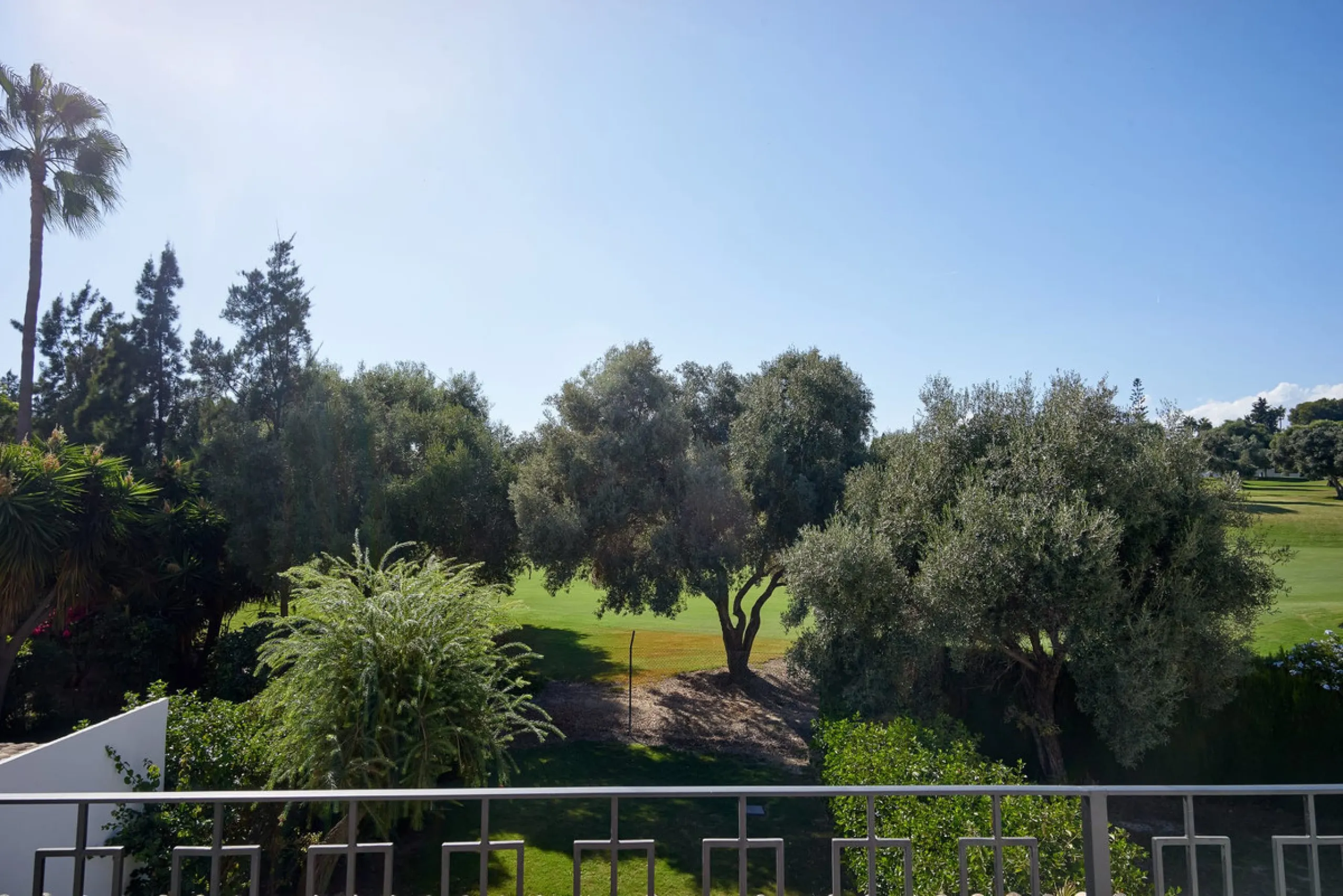 Frontline Aloha Golf townhouse nestled in the prestigious Golf Valley of Nueva Andalucía, this beautifully designed three-story townhouse offers a seamless blend of Mediterranean charm and modern living. Recently renovated, the property captures the lifes