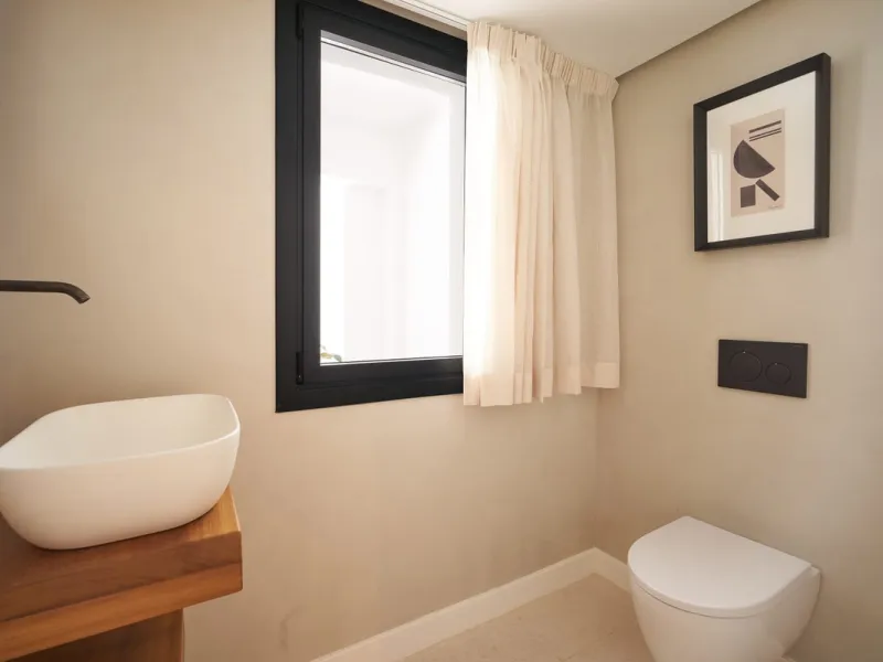 Frontline Aloha Golf townhouse nestled in the prestigious Golf Valley of Nueva Andalucía, this beautifully designed three-story townhouse offers a seamless blend of Mediterranean charm and modern living. Recently renovated, the property captures the lifes