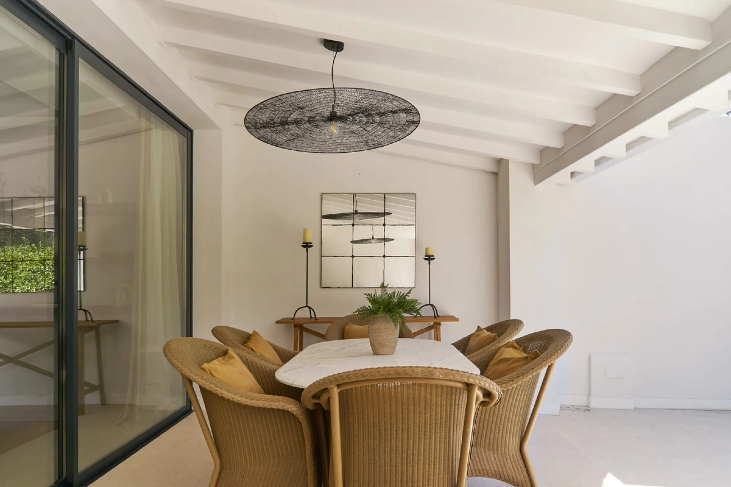 Frontline Aloha Golf townhouse nestled in the prestigious Golf Valley of Nueva Andalucía, this beautifully designed three-story townhouse offers a seamless blend of Mediterranean charm and modern living. Recently renovated, the property captures the lifes