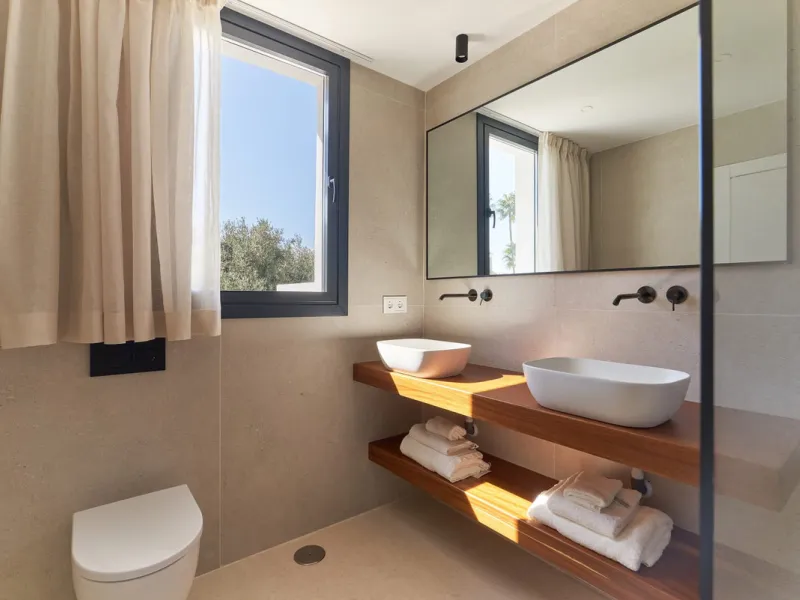 Frontline Aloha Golf townhouse nestled in the prestigious Golf Valley of Nueva Andalucía, this beautifully designed three-story townhouse offers a seamless blend of Mediterranean charm and modern living. Recently renovated, the property captures the lifes