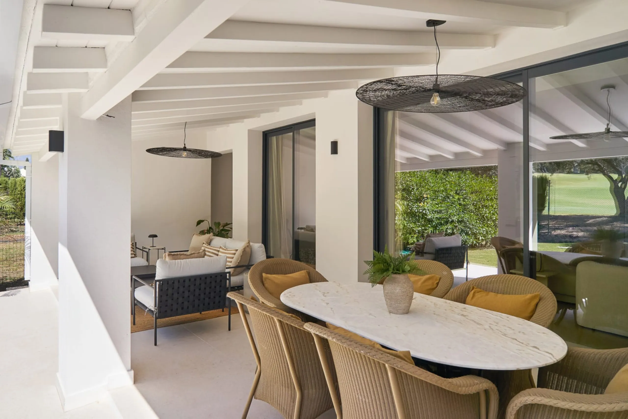 Frontline Aloha Golf townhouse nestled in the prestigious Golf Valley of Nueva Andalucía, this beautifully designed three-story townhouse offers a seamless blend of Mediterranean charm and modern living. Recently renovated, the property captures the lifes