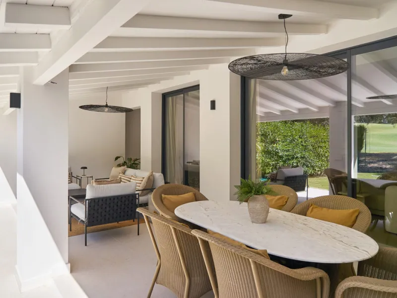 Frontline Aloha Golf townhouse nestled in the prestigious Golf Valley of Nueva Andalucía, this beautifully designed three-story townhouse offers a seamless blend of Mediterranean charm and modern living. Recently renovated, the property captures the lifes
