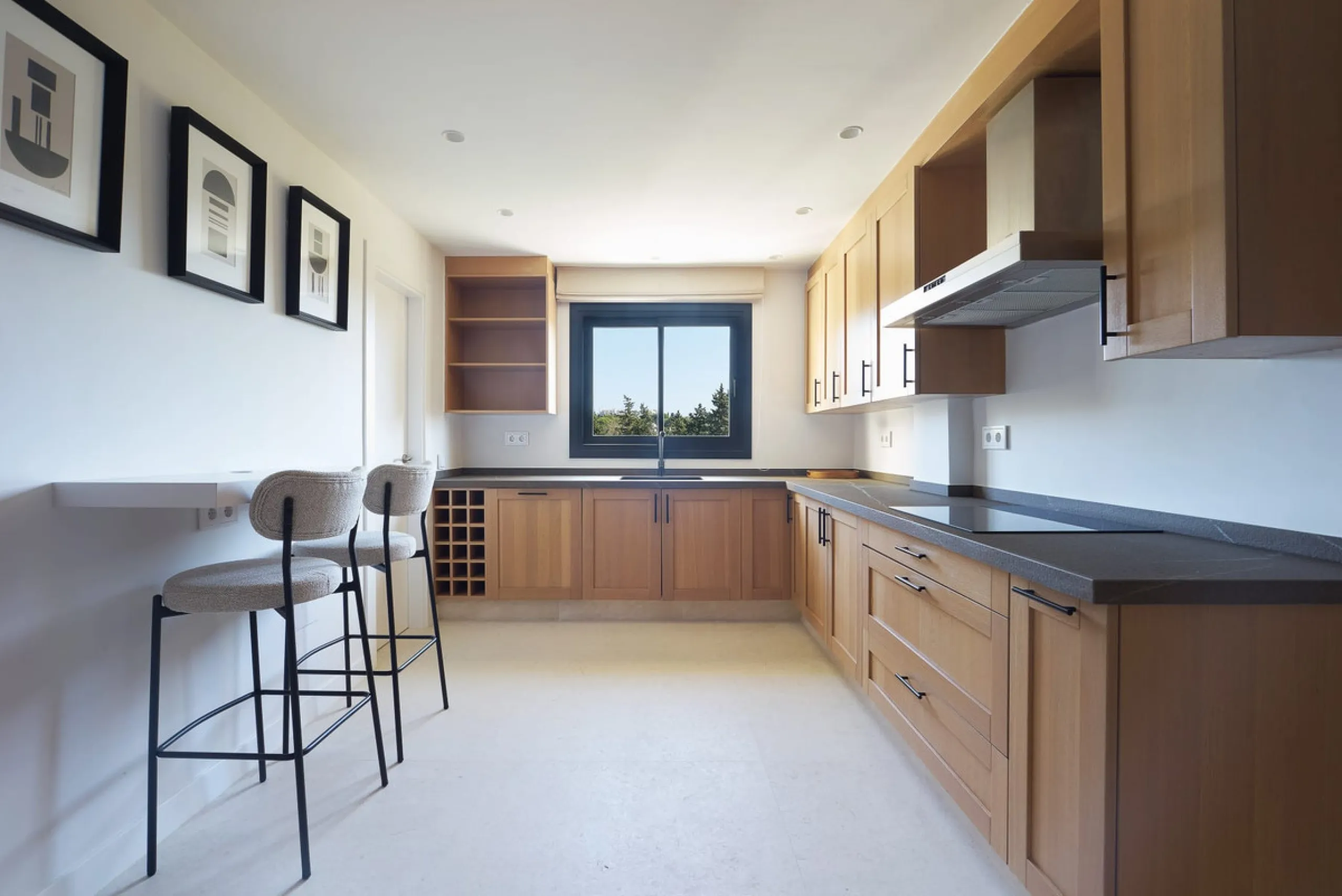 Frontline Aloha Golf townhouse nestled in the prestigious Golf Valley of Nueva Andalucía, this beautifully designed three-story townhouse offers a seamless blend of Mediterranean charm and modern living. Recently renovated, the property captures the lifes