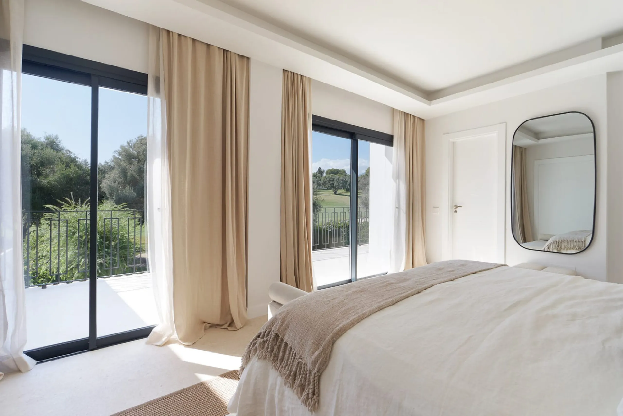 Frontline Aloha Golf townhouse nestled in the prestigious Golf Valley of Nueva Andalucía, this beautifully designed three-story townhouse offers a seamless blend of Mediterranean charm and modern living. Recently renovated, the property captures the lifes