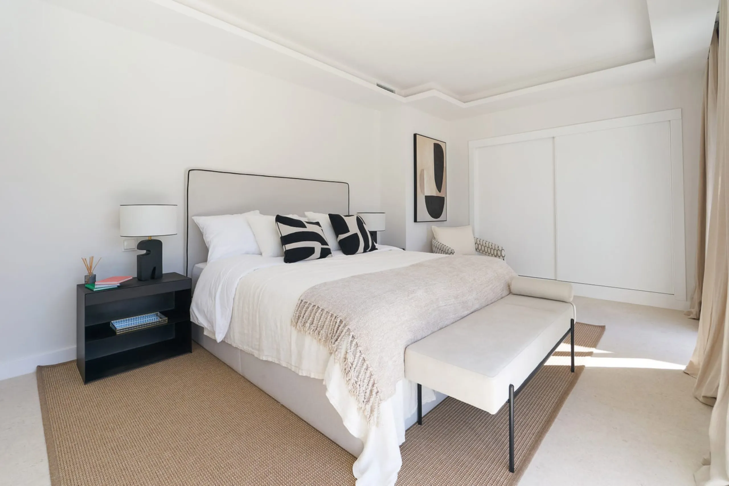 Frontline Aloha Golf townhouse nestled in the prestigious Golf Valley of Nueva Andalucía, this beautifully designed three-story townhouse offers a seamless blend of Mediterranean charm and modern living. Recently renovated, the property captures the lifes