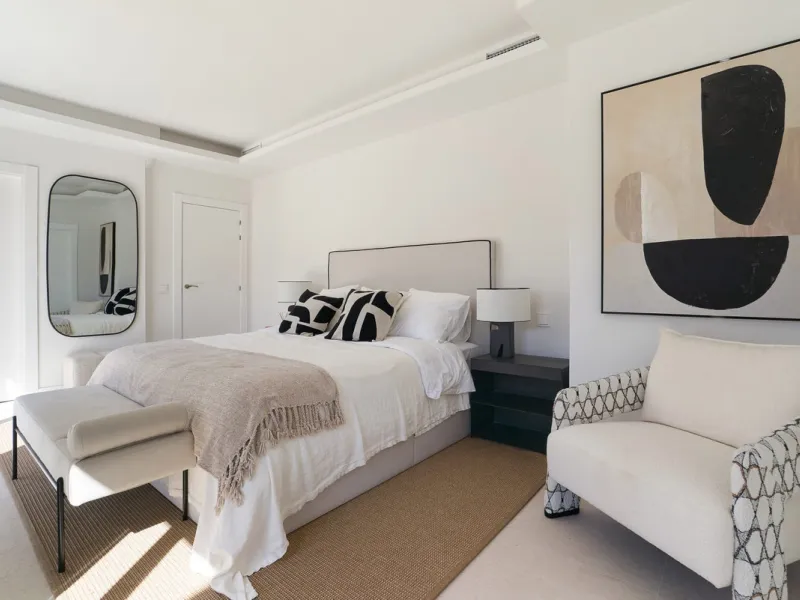 Frontline Aloha Golf townhouse nestled in the prestigious Golf Valley of Nueva Andalucía, this beautifully designed three-story townhouse offers a seamless blend of Mediterranean charm and modern living. Recently renovated, the property captures the lifes
