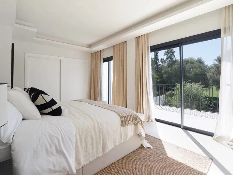 Frontline Aloha Golf townhouse nestled in the prestigious Golf Valley of Nueva Andalucía, this beautifully designed three-story townhouse offers a seamless blend of Mediterranean charm and modern living. Recently renovated, the property captures the lifes