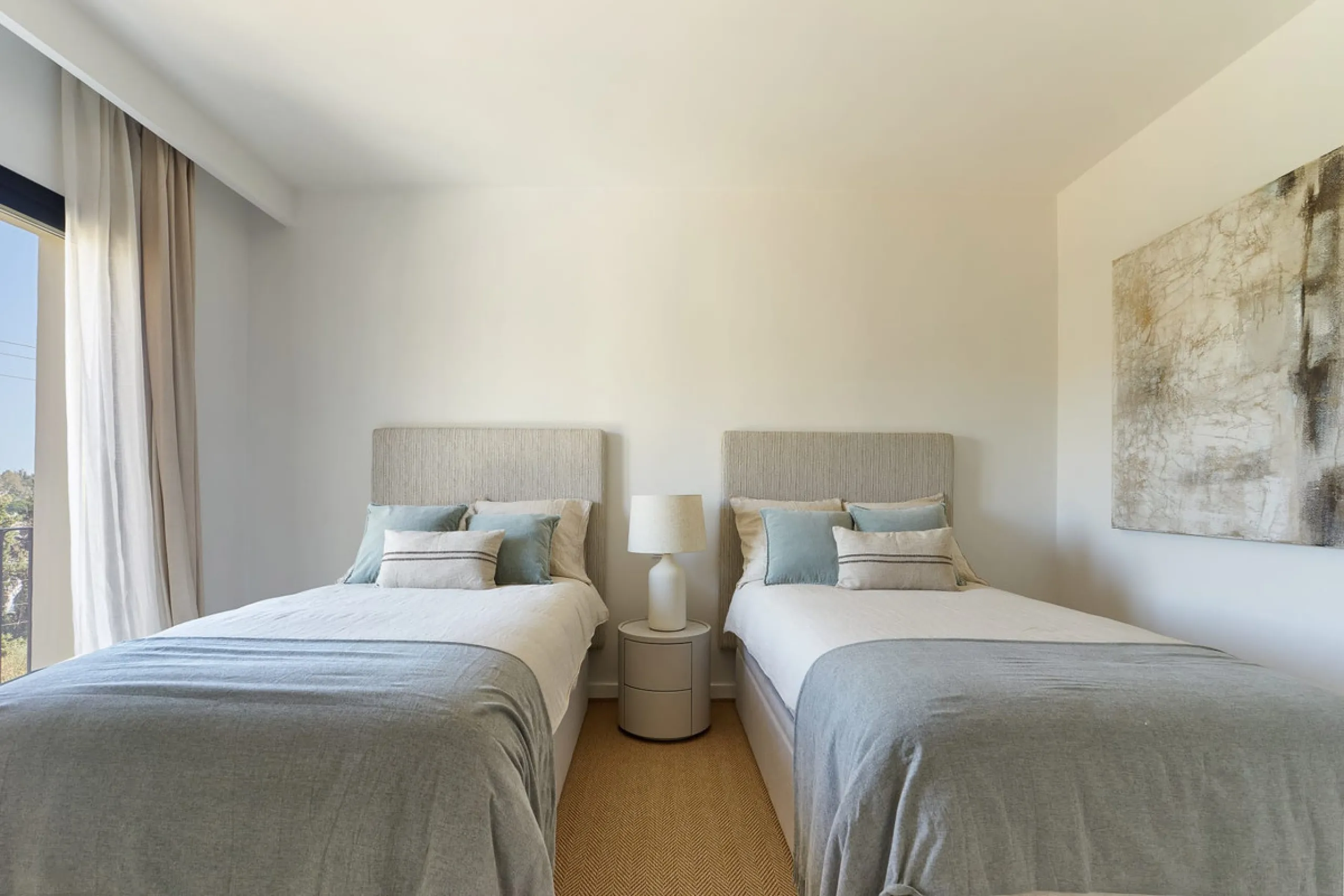 Frontline Aloha Golf townhouse nestled in the prestigious Golf Valley of Nueva Andalucía, this beautifully designed three-story townhouse offers a seamless blend of Mediterranean charm and modern living. Recently renovated, the property captures the lifes