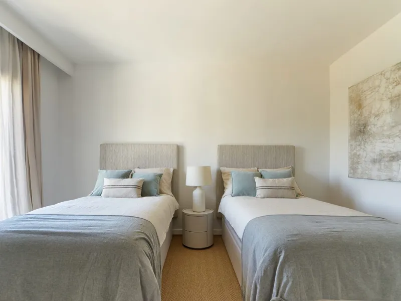 Frontline Aloha Golf townhouse nestled in the prestigious Golf Valley of Nueva Andalucía, this beautifully designed three-story townhouse offers a seamless blend of Mediterranean charm and modern living. Recently renovated, the property captures the lifes