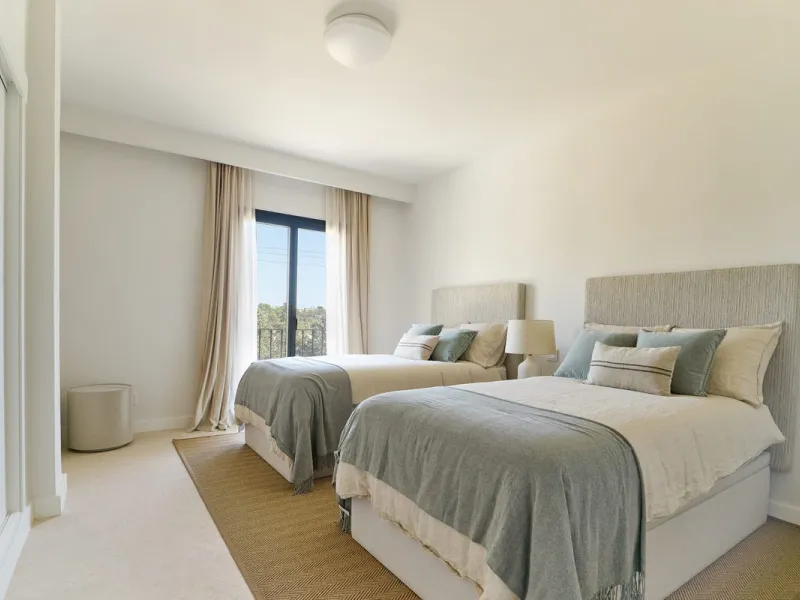Frontline Aloha Golf townhouse nestled in the prestigious Golf Valley of Nueva Andalucía, this beautifully designed three-story townhouse offers a seamless blend of Mediterranean charm and modern living. Recently renovated, the property captures the lifes