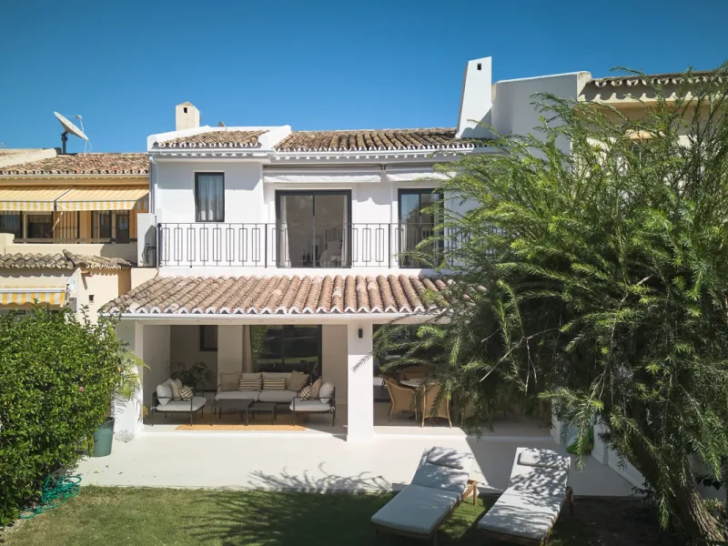 Frontline Aloha Golf townhouse nestled in the prestigious Golf Valley of Nueva Andalucía, this beautifully designed three-story townhouse offers a seamless blend of Mediterranean charm and modern living. Recently renovated, the property captures the lifes