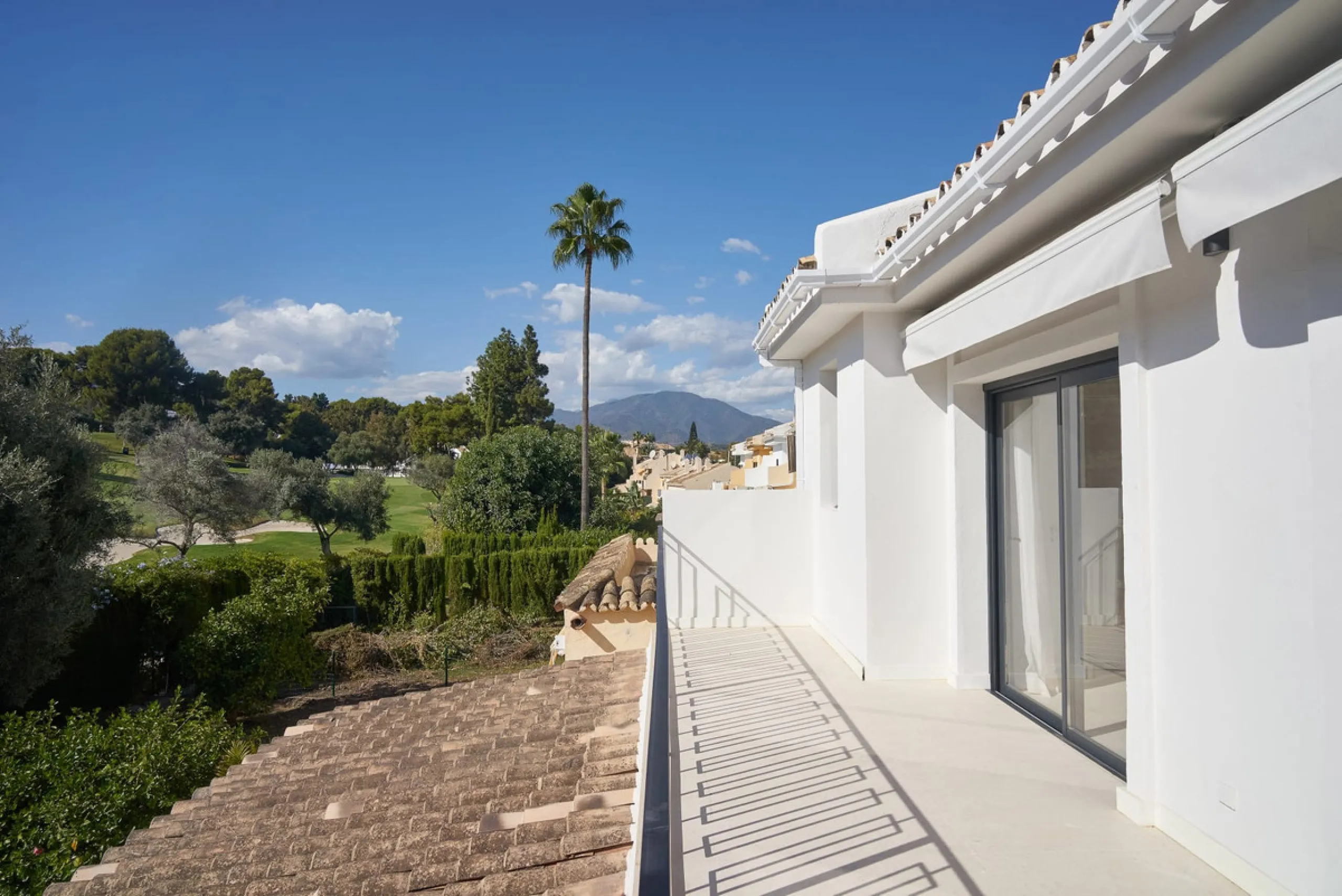 Frontline Aloha Golf townhouse nestled in the prestigious Golf Valley of Nueva Andalucía, this beautifully designed three-story townhouse offers a seamless blend of Mediterranean charm and modern living. Recently renovated, the property captures the lifes