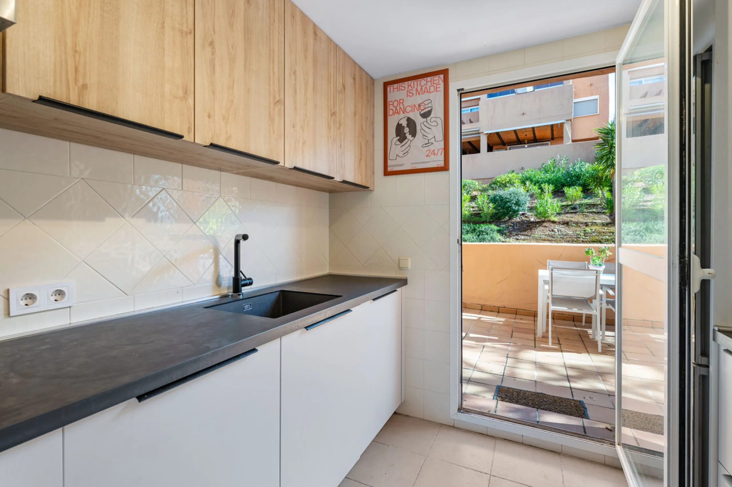 This bright two-bedroom, two-bathroom apartment is located in the well-maintained