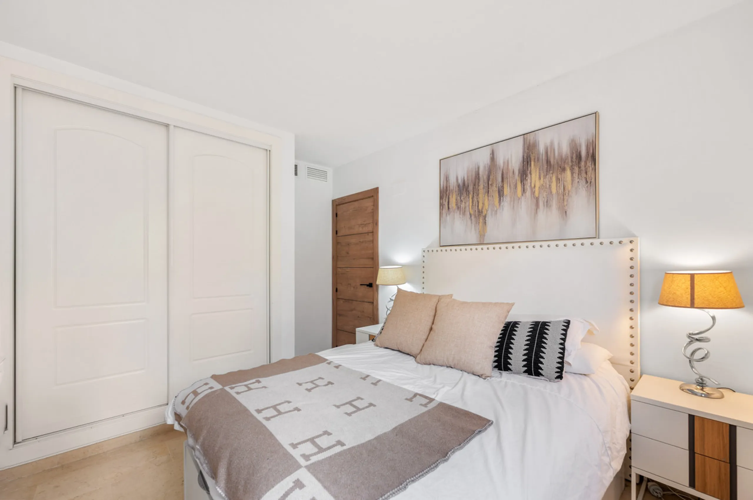 This bright two-bedroom, two-bathroom apartment is located in the well-maintained