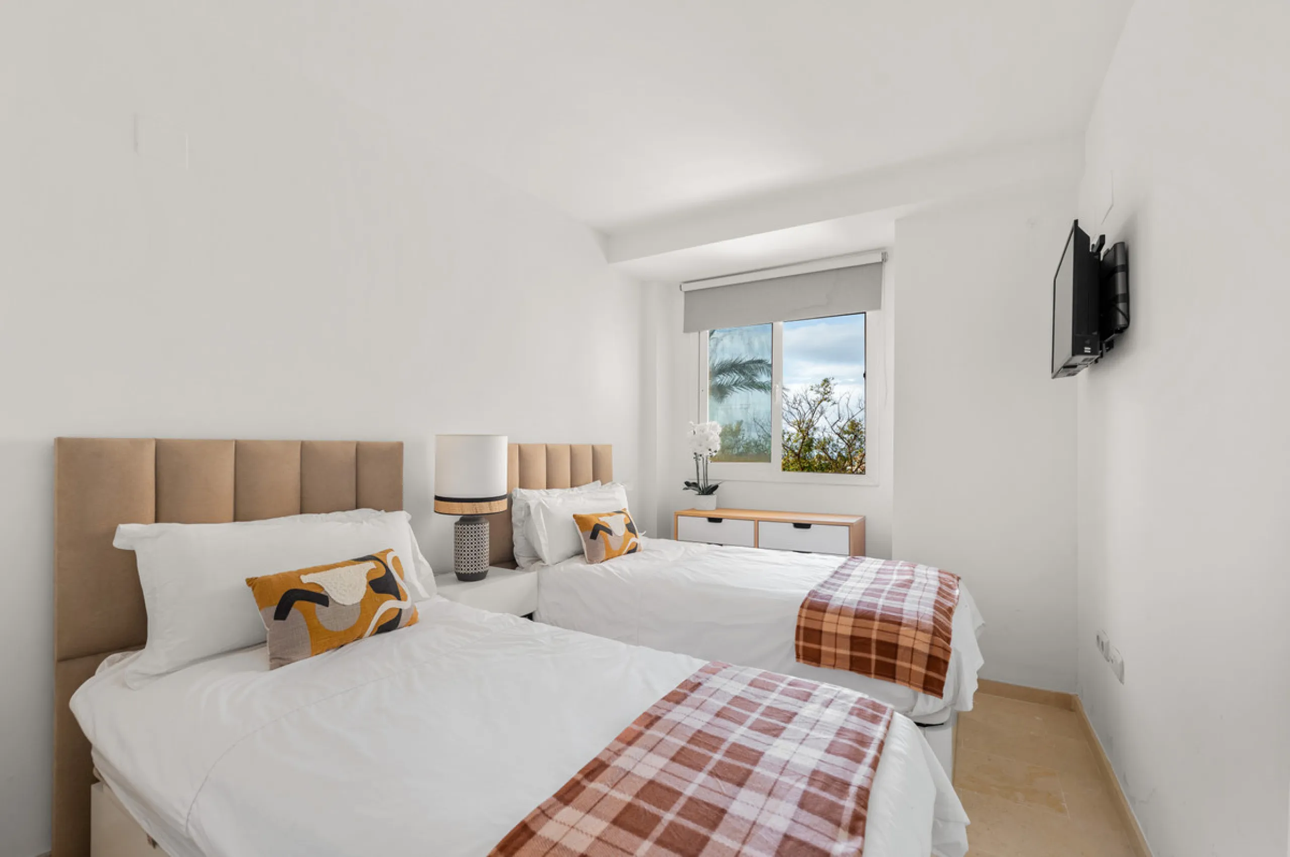 This bright two-bedroom, two-bathroom apartment is located in the well-maintained