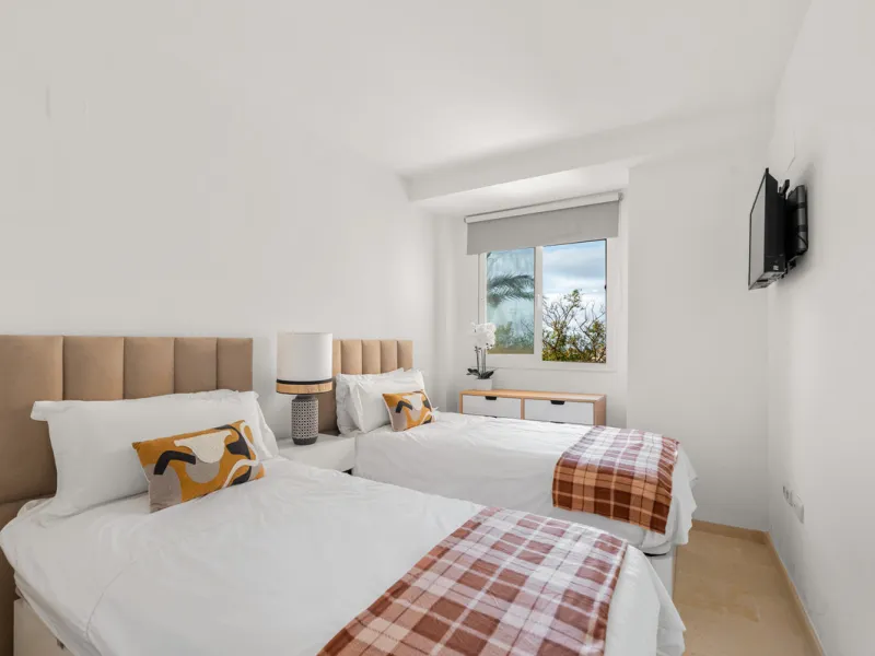 This bright two-bedroom, two-bathroom apartment is located in the well-maintained