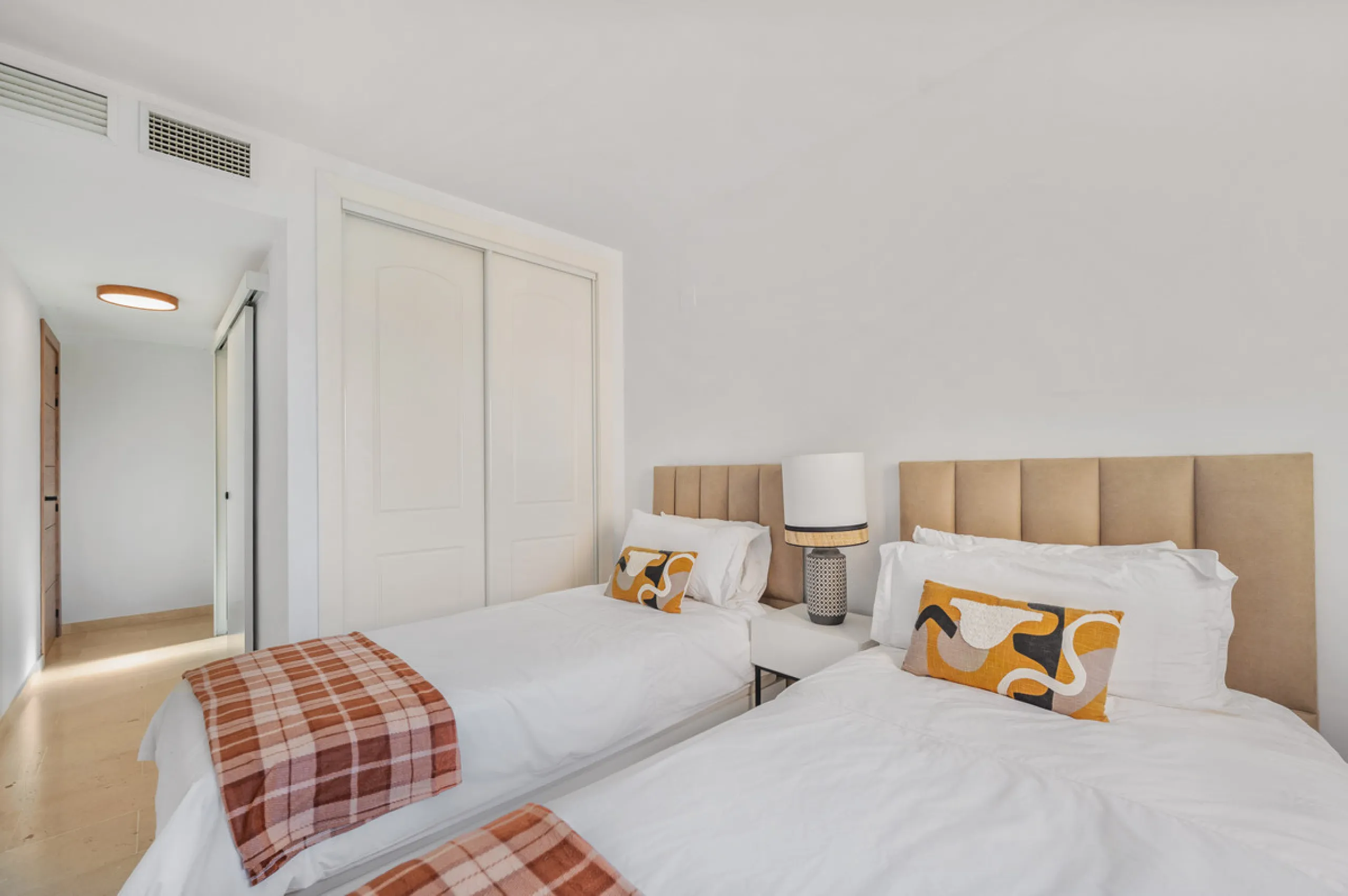 This bright two-bedroom, two-bathroom apartment is located in the well-maintained