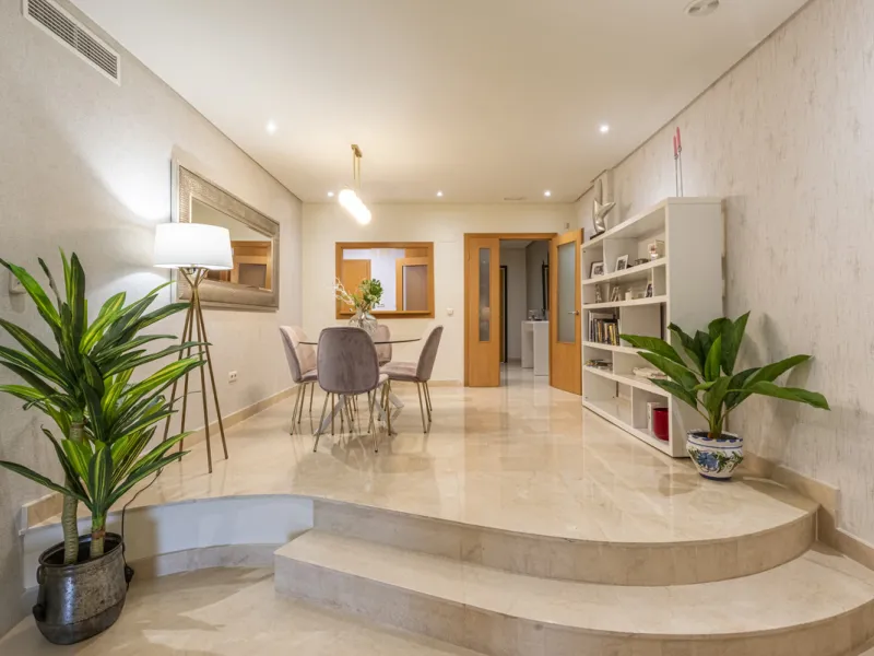 This modern and inviting two-bedroom apartment, nestled within the exclusive Las Mimosas complex, offers a truly exceptional living experience.