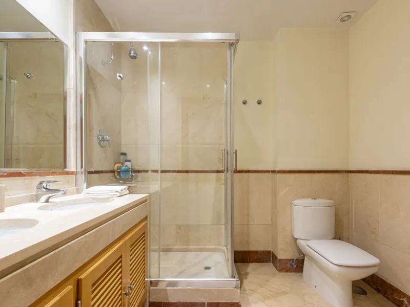 This modern and inviting two-bedroom apartment, nestled within the exclusive Las Mimosas complex, offers a truly exceptional living experience.