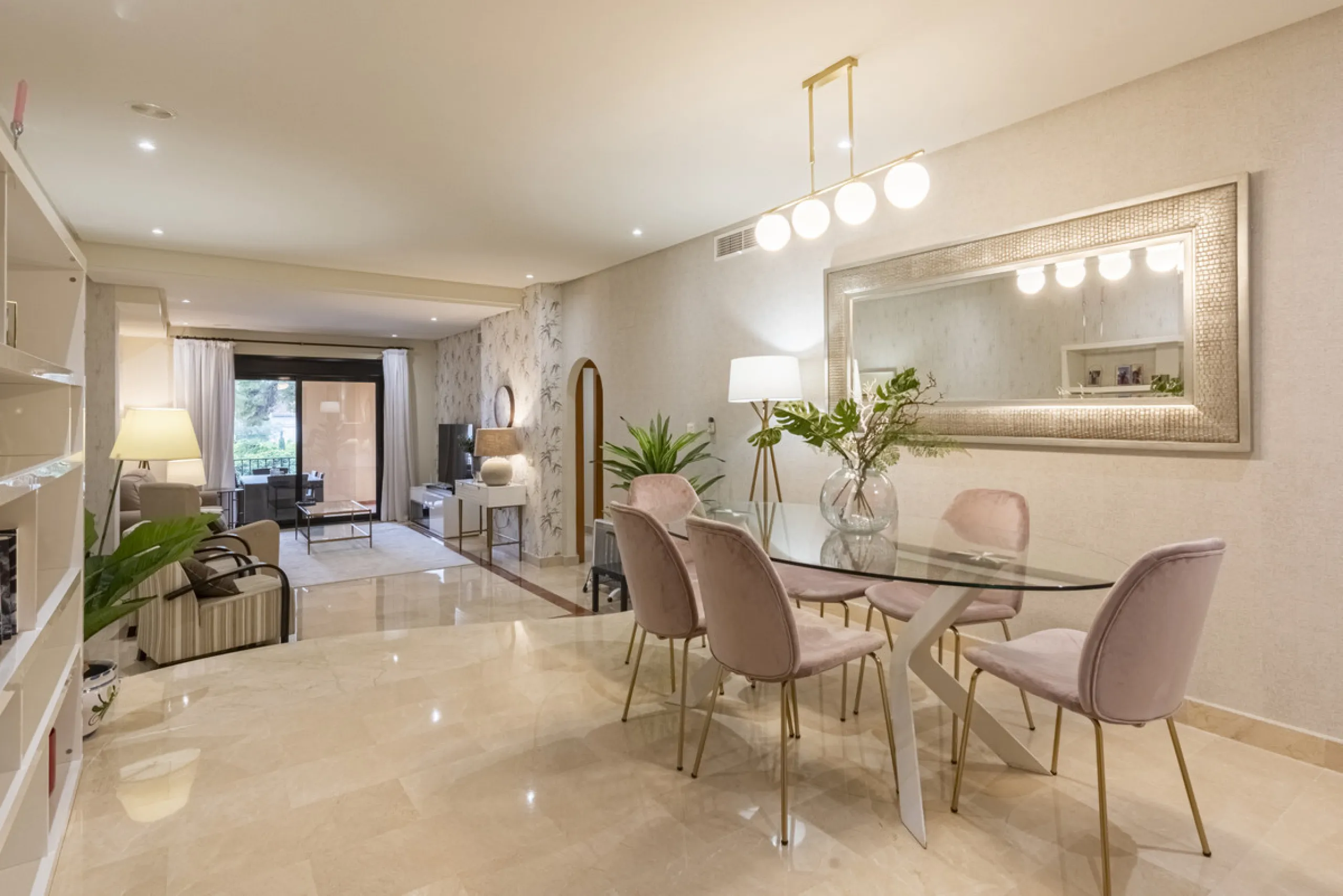 This modern and inviting two-bedroom apartment, nestled within the exclusive Las Mimosas complex, offers a truly exceptional living experience.