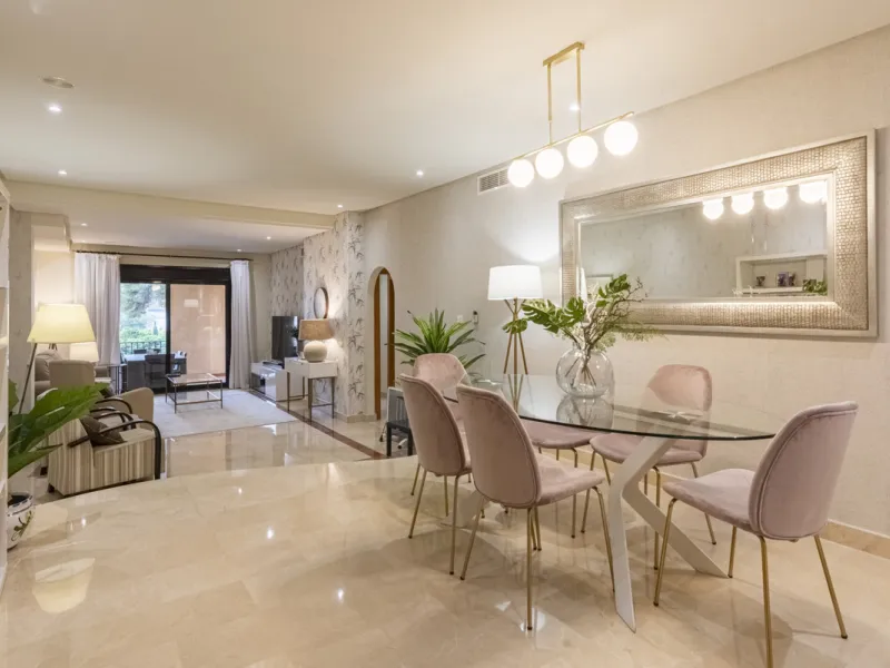 This modern and inviting two-bedroom apartment, nestled within the exclusive Las Mimosas complex, offers a truly exceptional living experience.