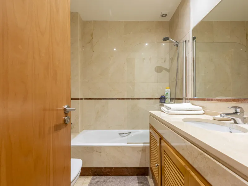 This modern and inviting two-bedroom apartment, nestled within the exclusive Las Mimosas complex, offers a truly exceptional living experience.