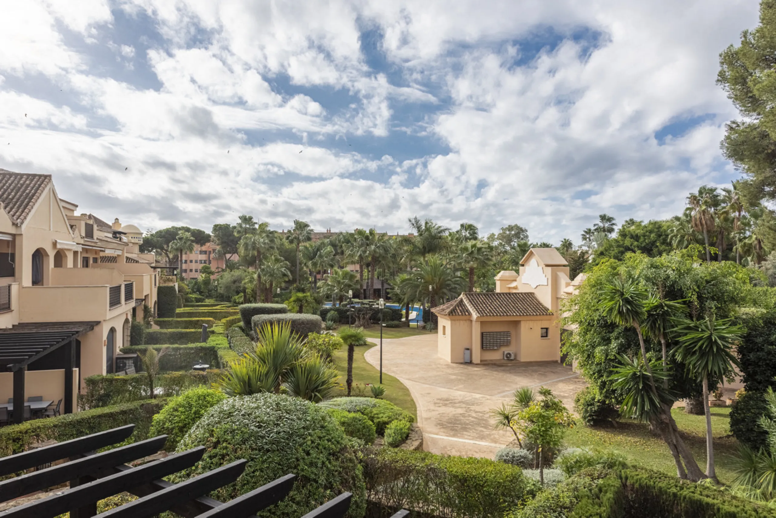 This modern and inviting two-bedroom apartment, nestled within the exclusive Las Mimosas complex, offers a truly exceptional living experience.