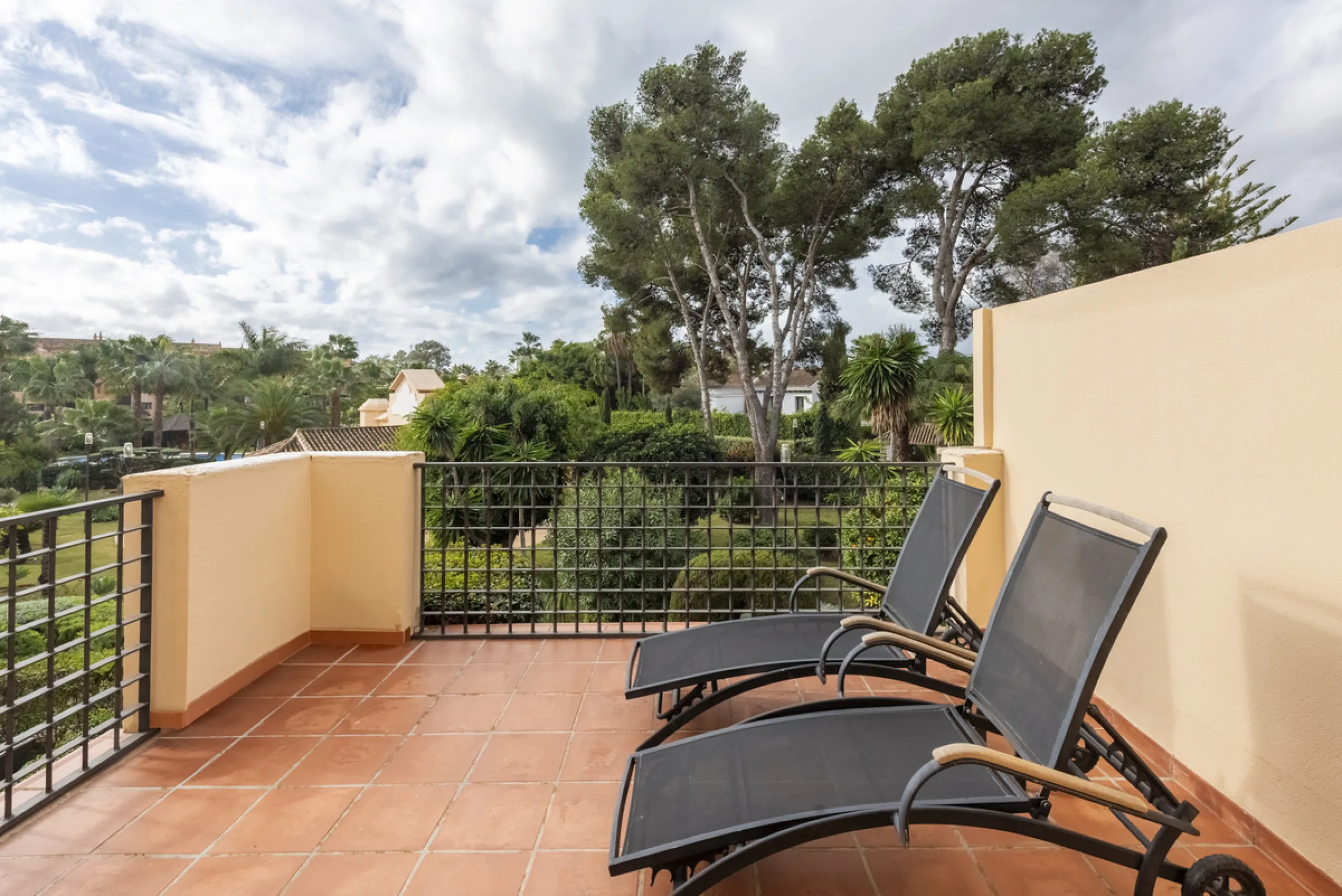 This modern and inviting two-bedroom apartment, nestled within the exclusive Las Mimosas complex, offers a truly exceptional living experience.