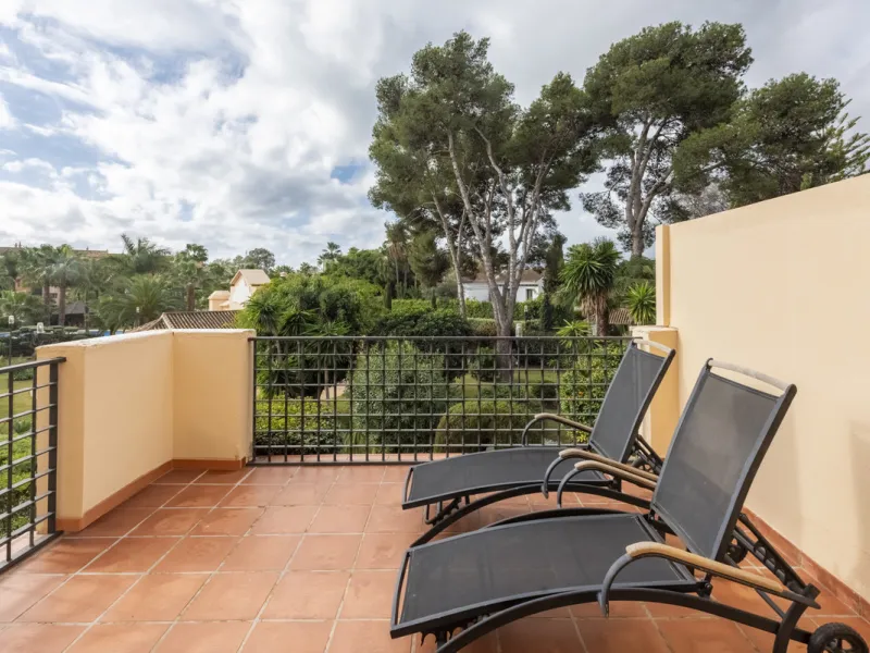 This modern and inviting two-bedroom apartment, nestled within the exclusive Las Mimosas complex, offers a truly exceptional living experience.