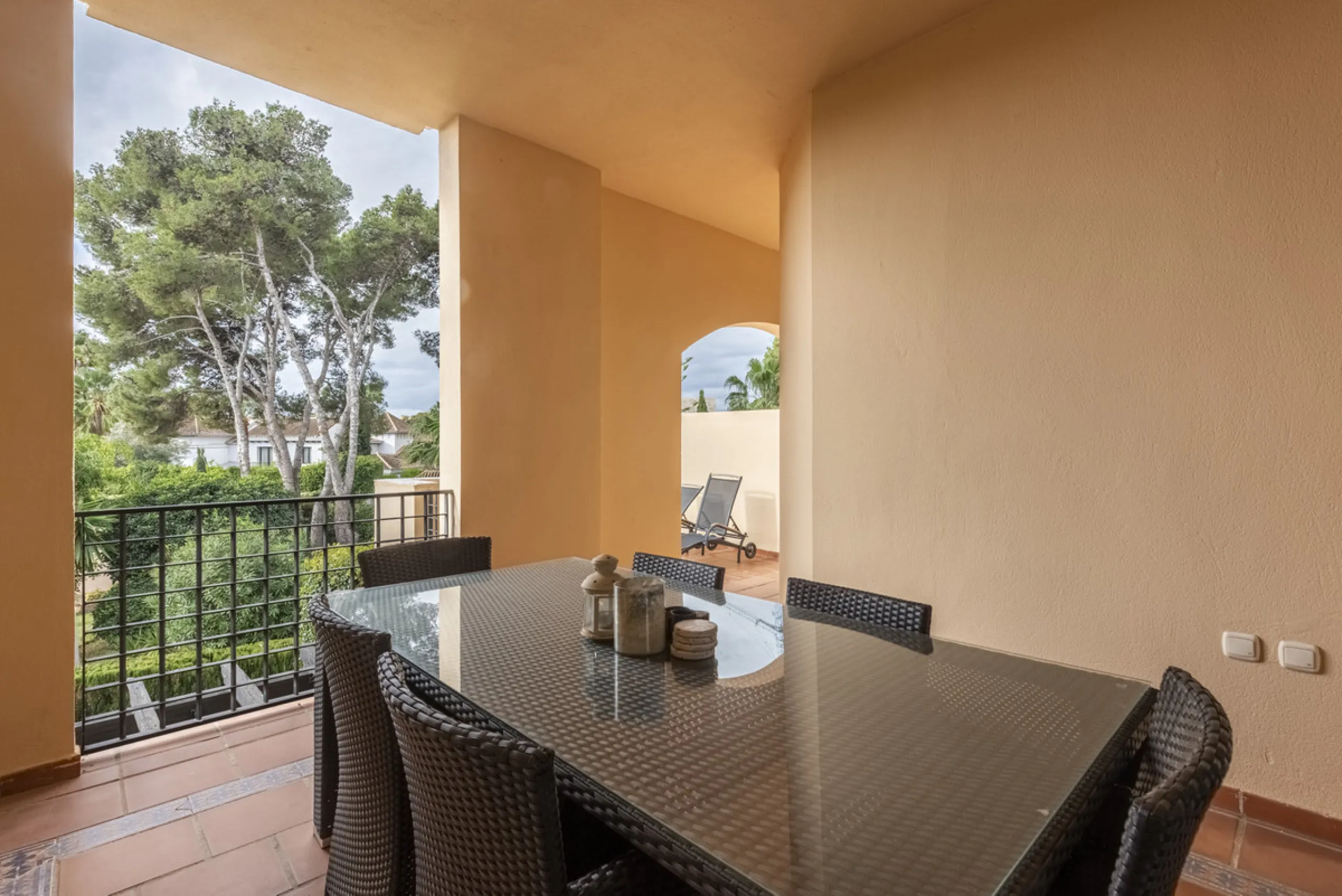 This modern and inviting two-bedroom apartment, nestled within the exclusive Las Mimosas complex, offers a truly exceptional living experience.