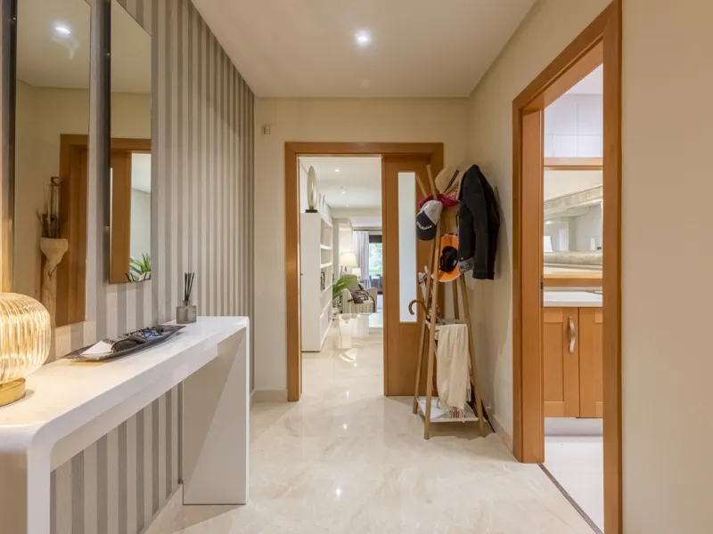 This modern and inviting two-bedroom apartment, nestled within the exclusive Las Mimosas complex, offers a truly exceptional living experience.