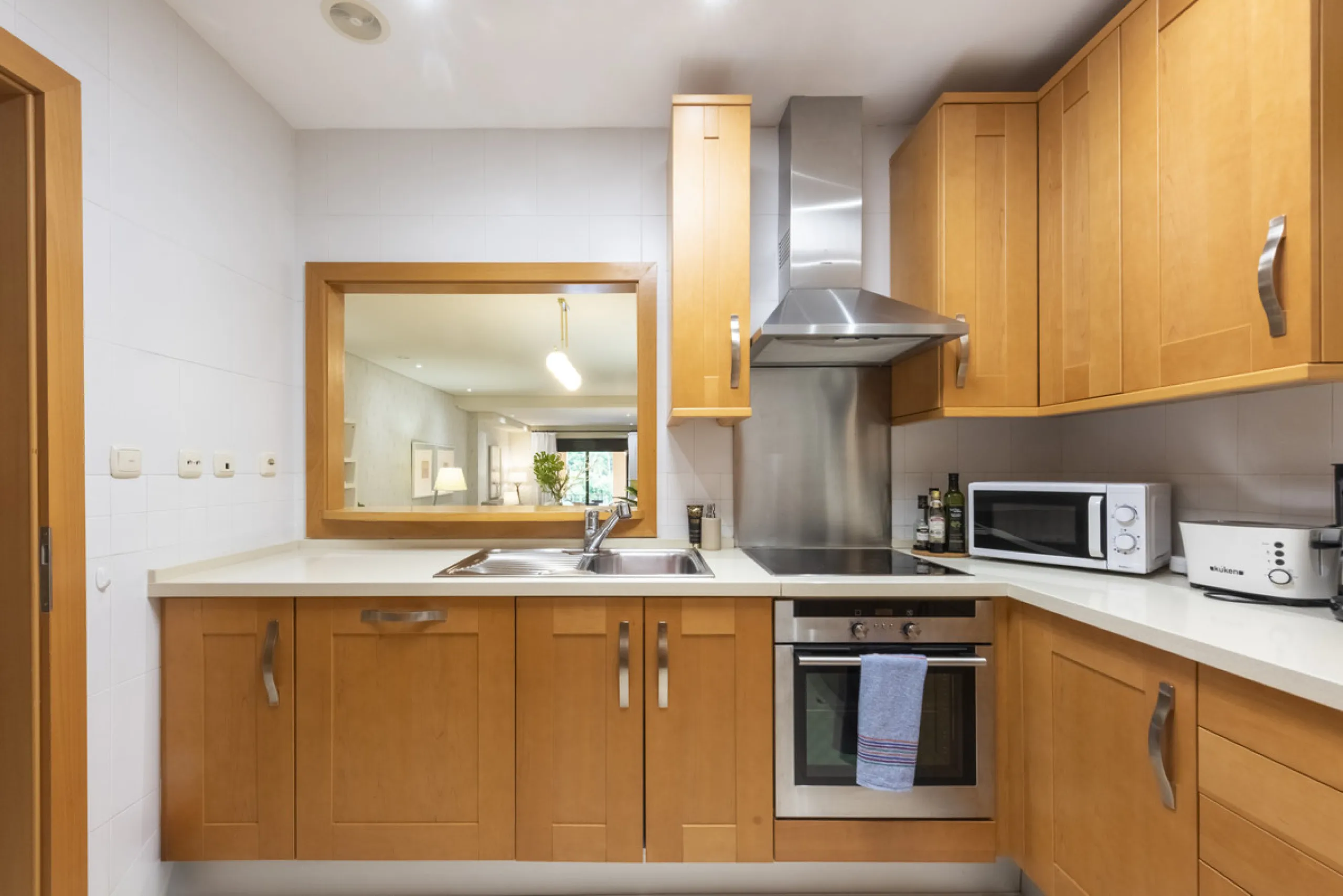 This modern and inviting two-bedroom apartment, nestled within the exclusive Las Mimosas complex, offers a truly exceptional living experience.